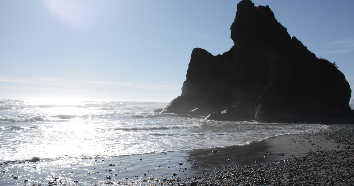 Gretchen Costanzo near the Puget Sound, reflecting the grounded and relational approach of her attachment coaching